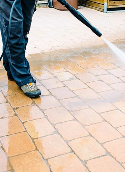 Pressure washing and paving